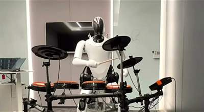Humanoid Robot Xiaomi CyberOne learns to Play Drums
